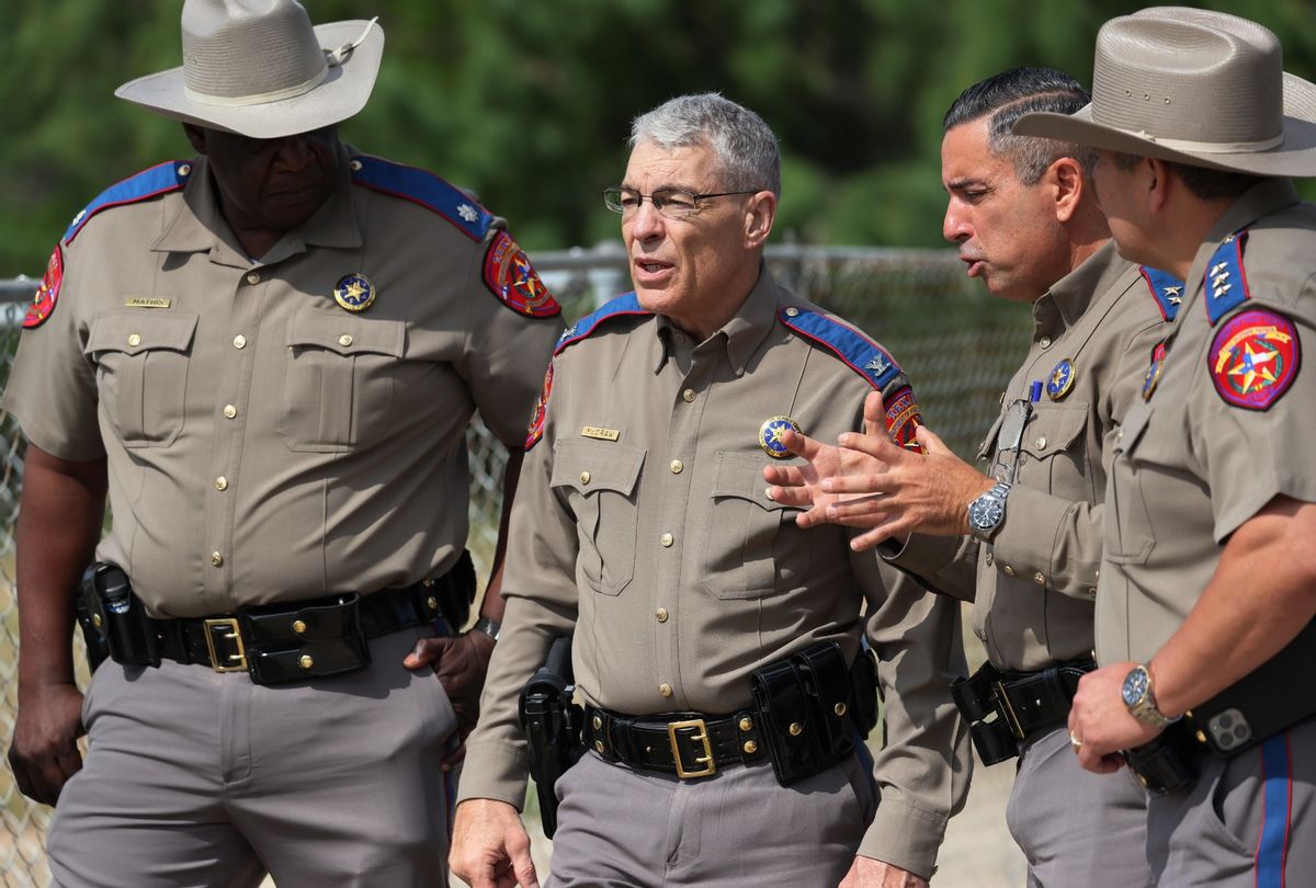 Steven C. McCraw, Director and Colonel of the Texas Department of Public Safety (2nd L), speaks with DPS State Troopers near Robb Elementary School on May 30, 2022 in Uvalde, Texas. (Michael M. Santiago/Getty Images)