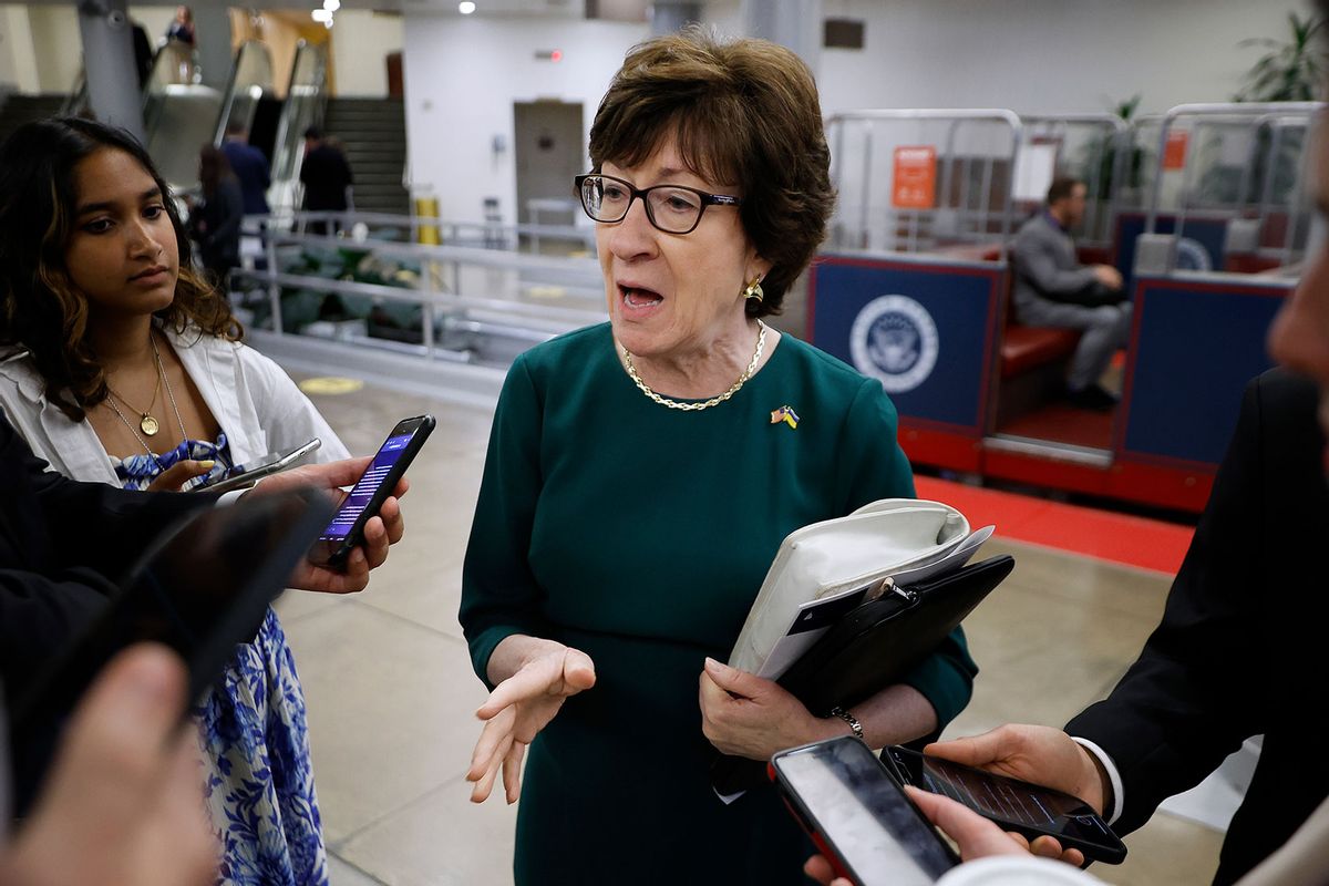 Sen. Susan Collins (R-ME) talks with reporters as she walks through the Senate subway following the weekly Senate Republican policy luncheon at the U.S. Capitol on June 14, 2022 in Washington, DC. (Chip Somodevilla/Getty Images)