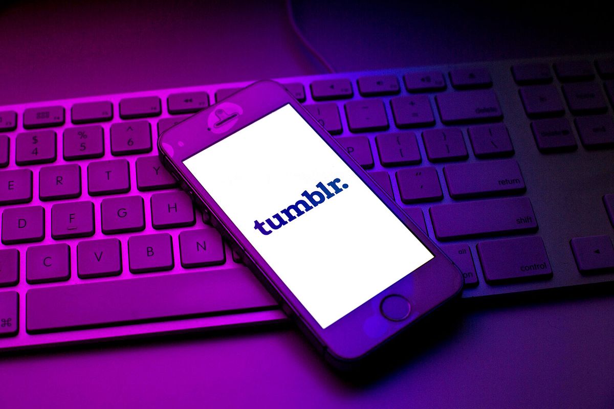 In this photo illustration, a Tumblr logo is seen displayed on a smartphone on top of a computer keyboard. (Photo Illustration by Thiago Prudencio/SOPA Images/LightRocket via Getty Images)