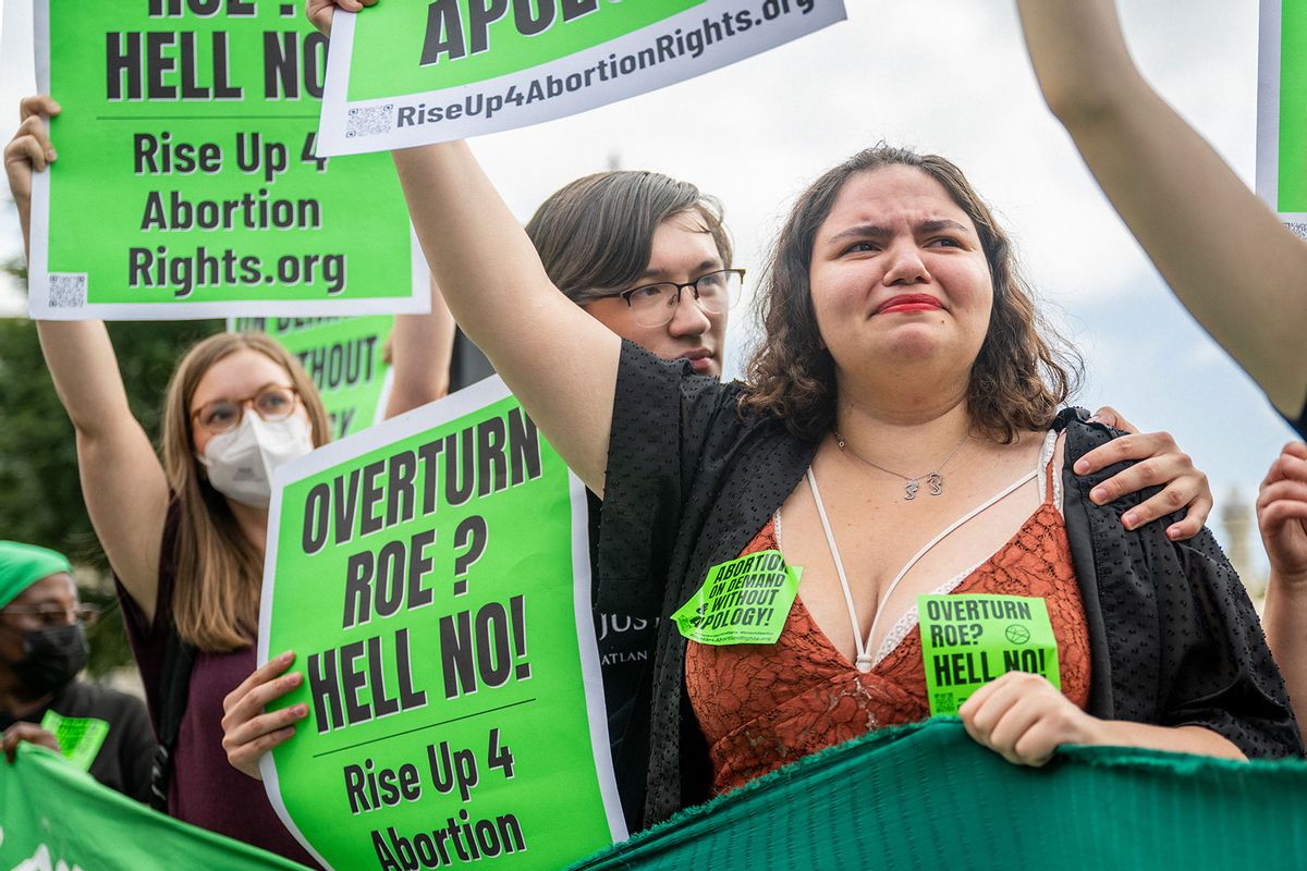 Abortion rights activists react to the Dobbs v Jackson Women's Health Organization ruling in front of the U.S. Supreme Court on June 24, 2022 in Washington, DC. (Brandon Bell/Getty Images)