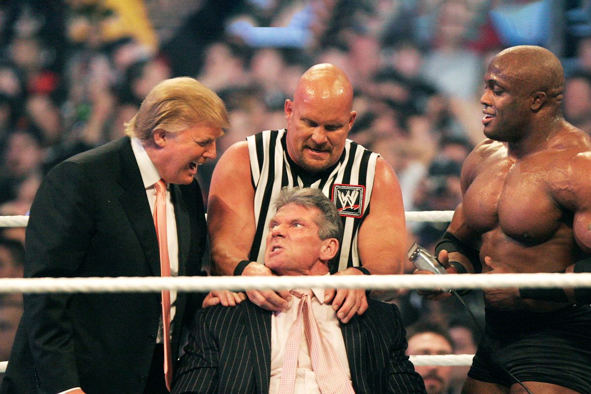 WWE chairman Vince McMahon (C) has his head shaved by Donald Trump (L) and Bobby Lashley (R) while being held down by ''Stone Cold'' Steve Austin after losing a bet in the Battle of the Billionaires at the 2007 World Wrestling Entertainment's Wrestlemania at Ford Field on April 1, 2007 in Detroit, Michigan. (Bill Pugliano/Getty Images)