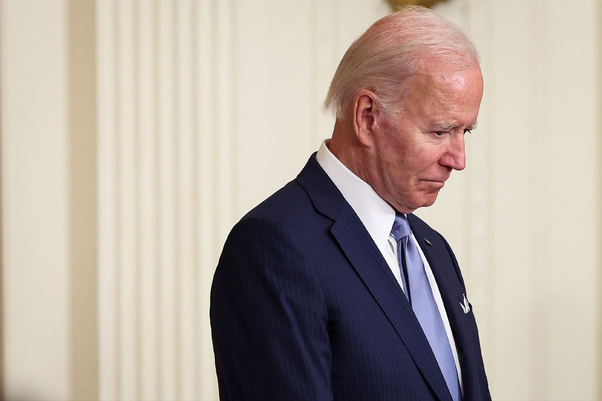 U.S. President Joe Biden bows his head in prayer (Win McNamee/Getty Images)