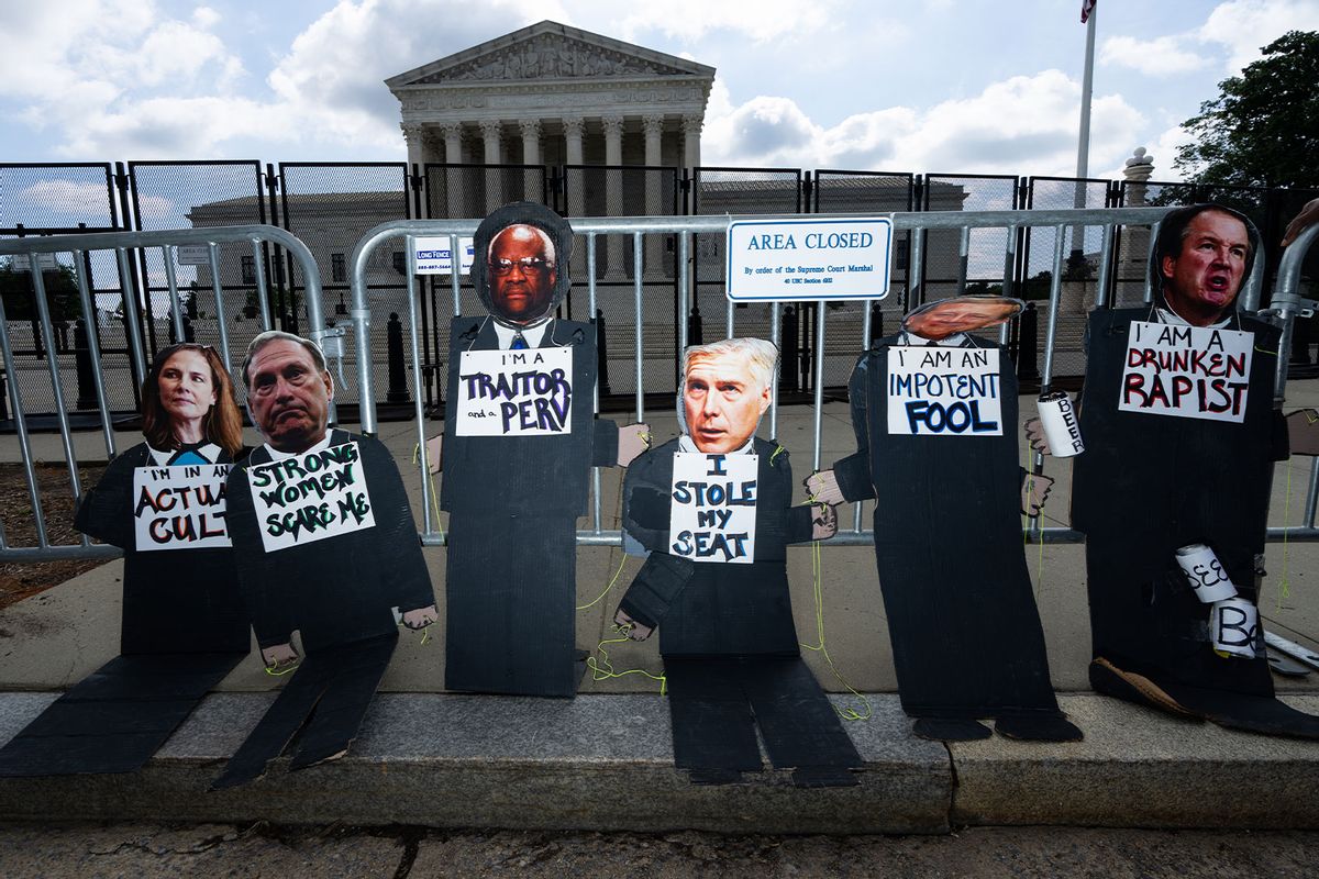 Cardboard cutouts of the conservative Supreme Court justices were propped up by pro-choice activists in front of the Supreme Court before the Dobbs v Jackson Womens Health Organization decision overturning Roe v Wade was handed down at the U.S. Supreme Court on Friday, June 24, 2022. (Bill Clark/CQ-Roll Call, Inc via Getty Images)