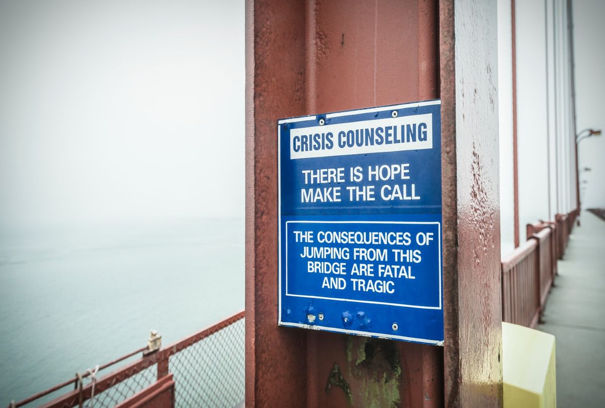 Suicide prevention sign on Golden Gate Bridge (David Madison/Getty Images)