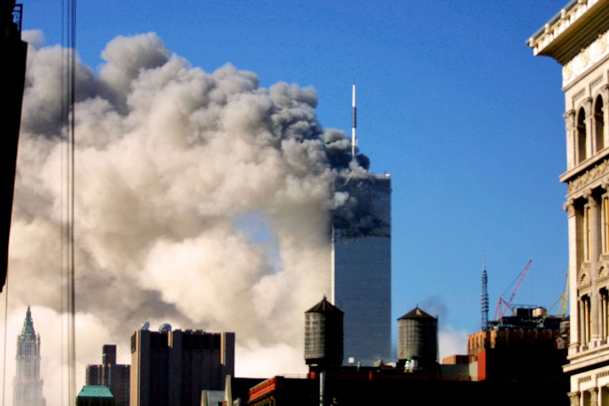 The World Trade Center burning after two airliners crashed into the buildings in New York City, Tuesday September 11, 2001. (Gabe Palacio/ImageDirect/Getty Images)