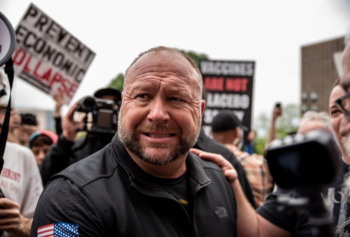 Infowars founder Alex Jones interacts with supporters at the Texas State Capital building on April 18, 2020 in Austin, Texas.  (Sergio Flores/Getty Images)
