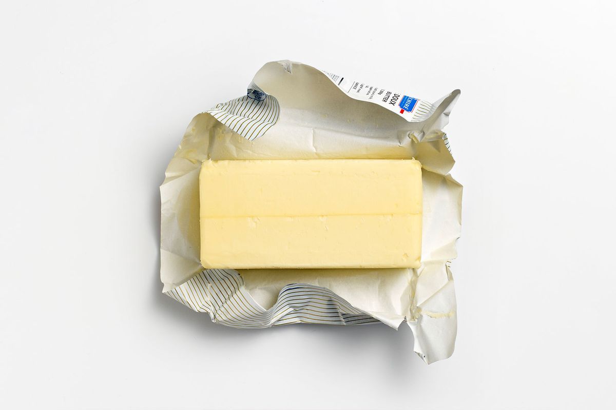 An unwrapped pat of butter on its wrapper (Hussey, Clinton)