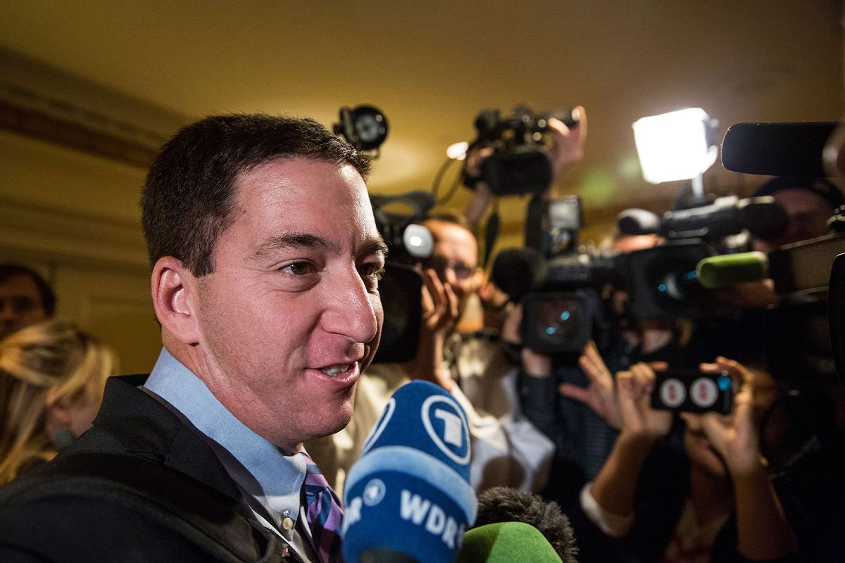 Investigative reporter Glenn Greenwald, who worked with National Security Agency leaker Edward Snowden, speaks to the media before accepting the George Polk Award along side Laura Poitras, Ewan MacAskill and Barton Gellman, for National Security Reporting on April 11, 2014 in New York City. (Andrew Burton/Getty Images)