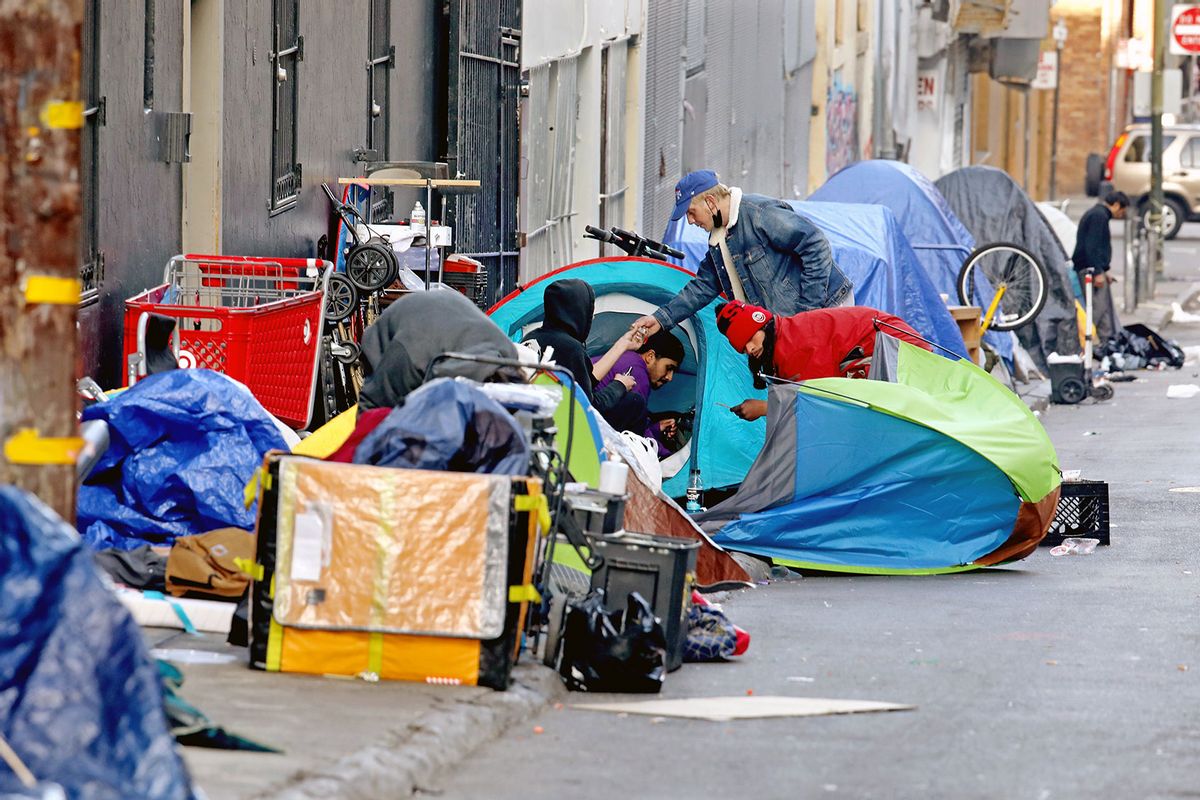 Homeless people in an encampment along Willow St. in the Tenderloin district of downtown on Thursday, Feb. 24, 2022 in San Francisco, CA. (Gary Coronado / Los Angeles Times via Getty Images)