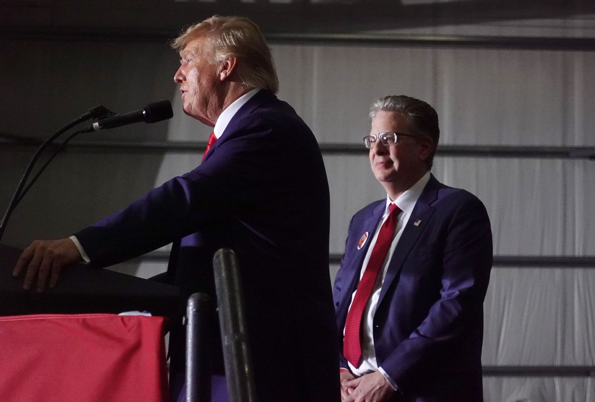 Former President Donald Trump endorses Matthew DePerno (R), who is running for the Michigan Republican party's nomination for state attorney general, during a rally on April 02, 2022 near Washington, Michigan.  ( Scott Olson/Getty Images)