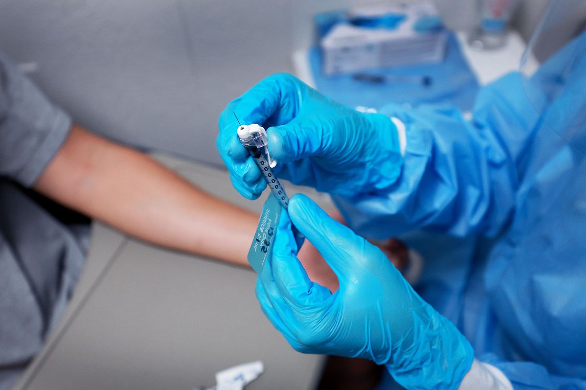 A registered nurse prepares to administer an intradermal monkeypox vaccine to a person at a vaccination site setup in Tropical Park by Miami-Dade County and Nomi Health on August 15, 2022 in Miami, Florida. (Joe Raedle/Getty Images)