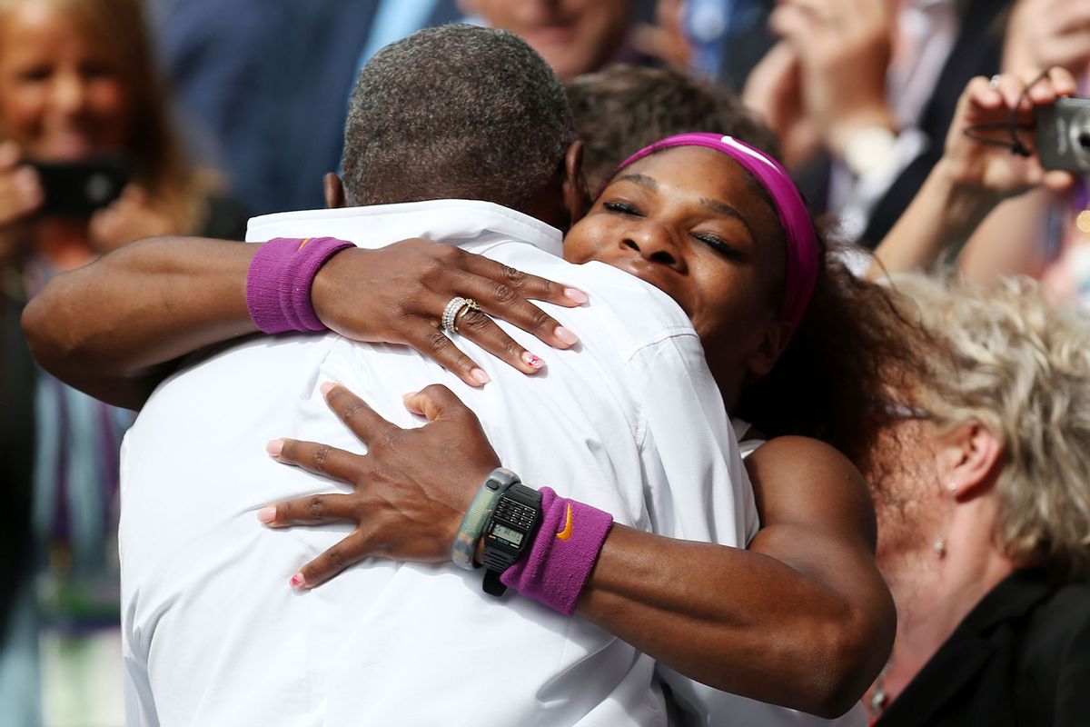 Serena Williams of the USA celebrates with her father Richard Williams after her Ladies’ Singles final match against Agnieszka Radwanska of Poland on day twelve of the Wimbledon Lawn Tennis Championships at the All England Lawn Tennis and Croquet Club on July 7, 2012 in London, England. (Clive Rose/Getty Images)