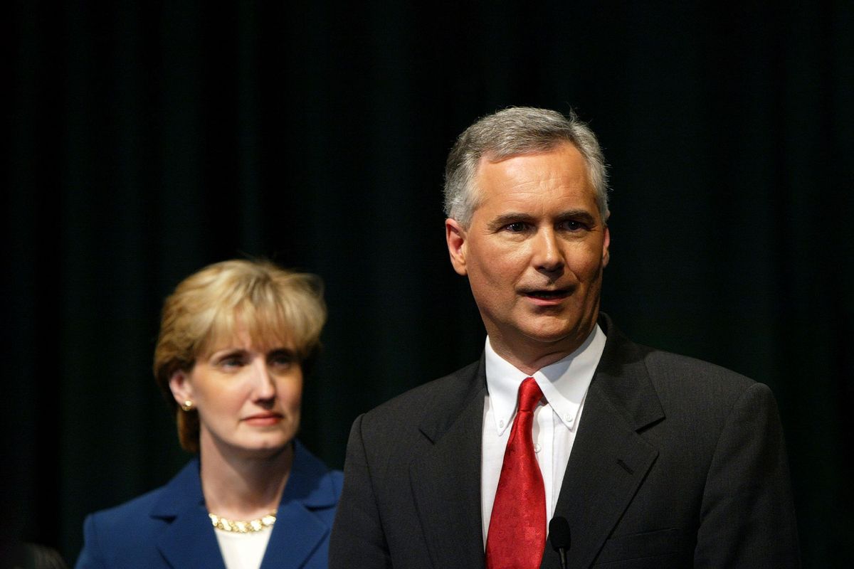 Republican gubernatorial candidate Tom McClintock speaks to reporters with his wife Lori after participating in a denate at California State University, Sacramento September 24, 2003 in Sacramento, California. (Justin Sullivan/Getty Images)