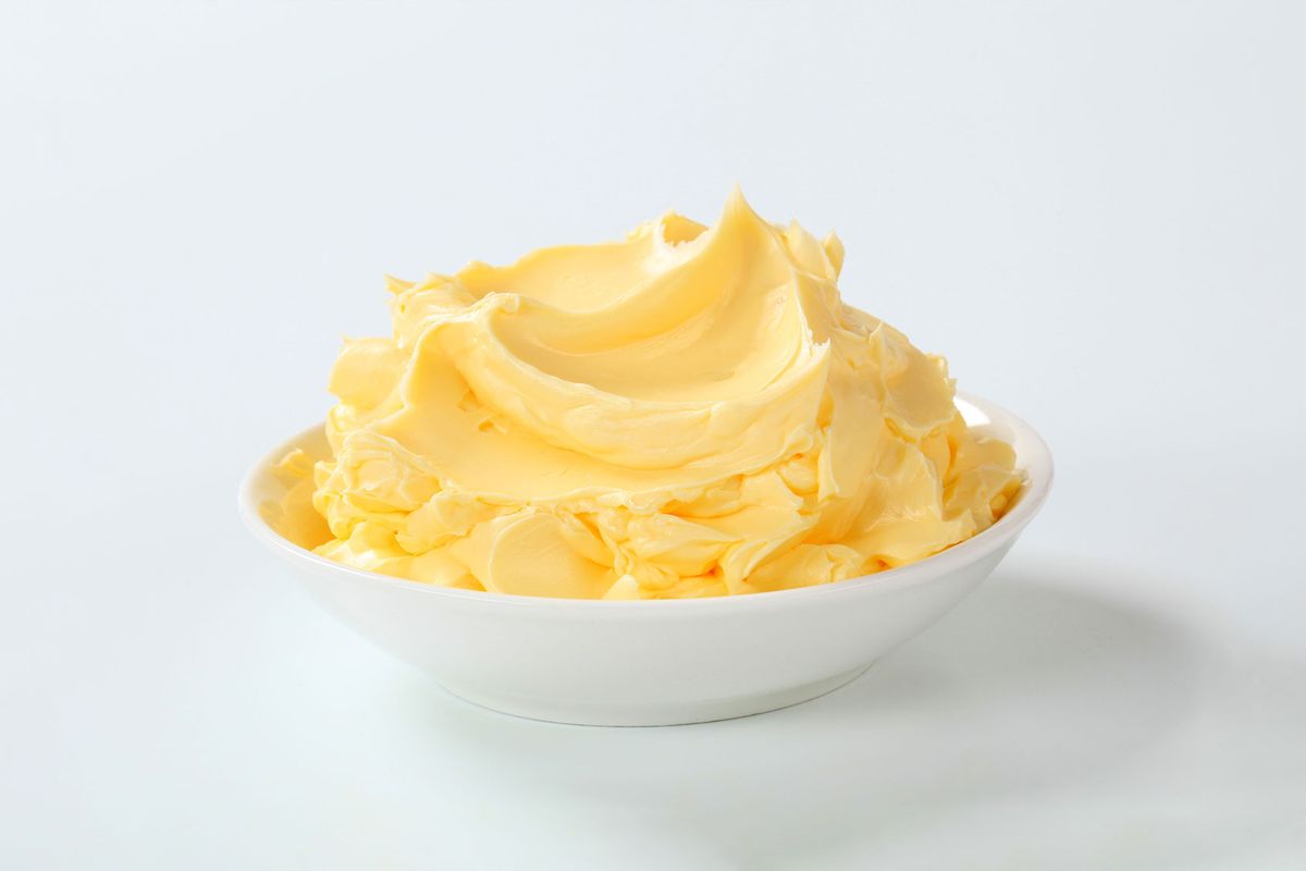 Bowl of homemade butter (Getty Images/milanfoto)