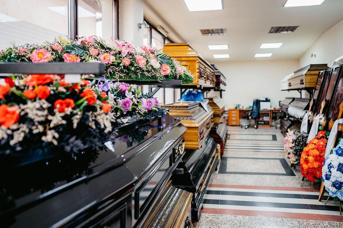 Shop selling coffins and funeral wreaths (Getty Images/urbazon)