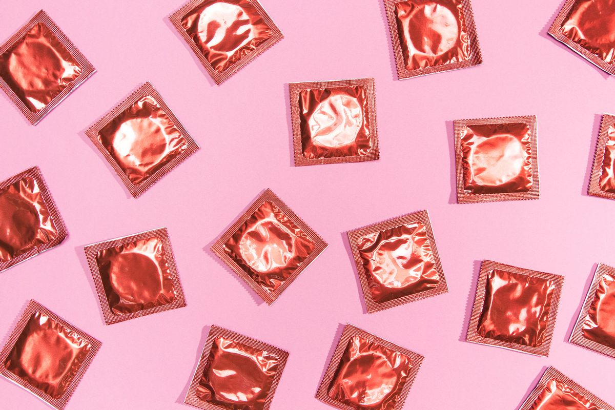 Condoms in red wrappers (Getty Images / Alberto Tudor / 500px)
