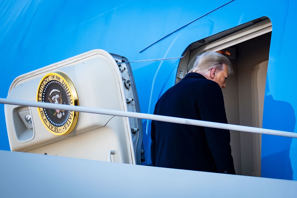 President Donald Trump boards Air Force One at Joint Base Andrews before boarding Air Force One for his last time as President on January 20, 2021. (Pete Marovich - Pool/Getty Images)