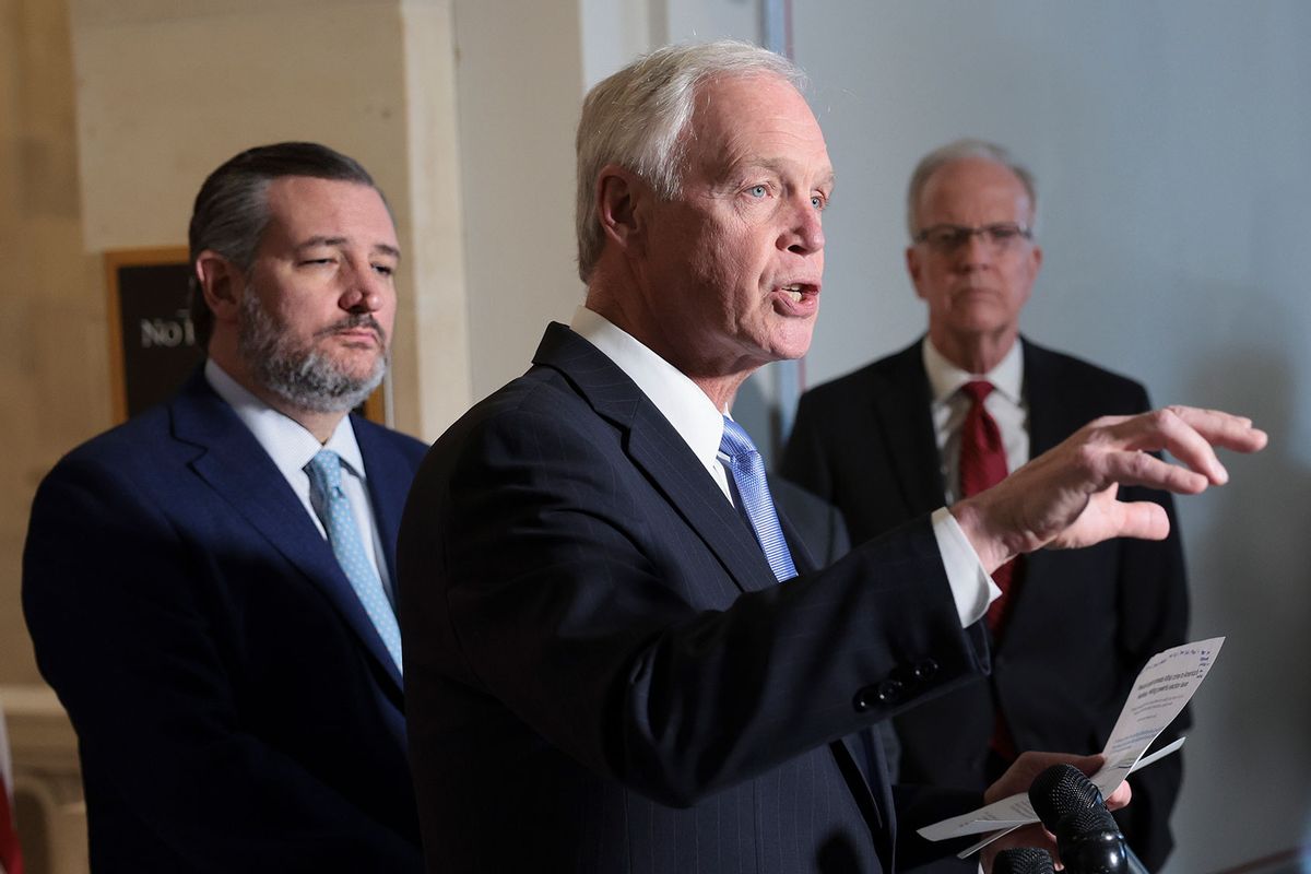 Sen. Ron Johnson (R-WI) speaks during a press conference on Capitol Hill on February 09, 2022 in Washington, DC, Sen. Ted Cruz (R-TX) and Sen. Jerry Moran (R-KS) in the back (Win McNamee/Getty Images)
