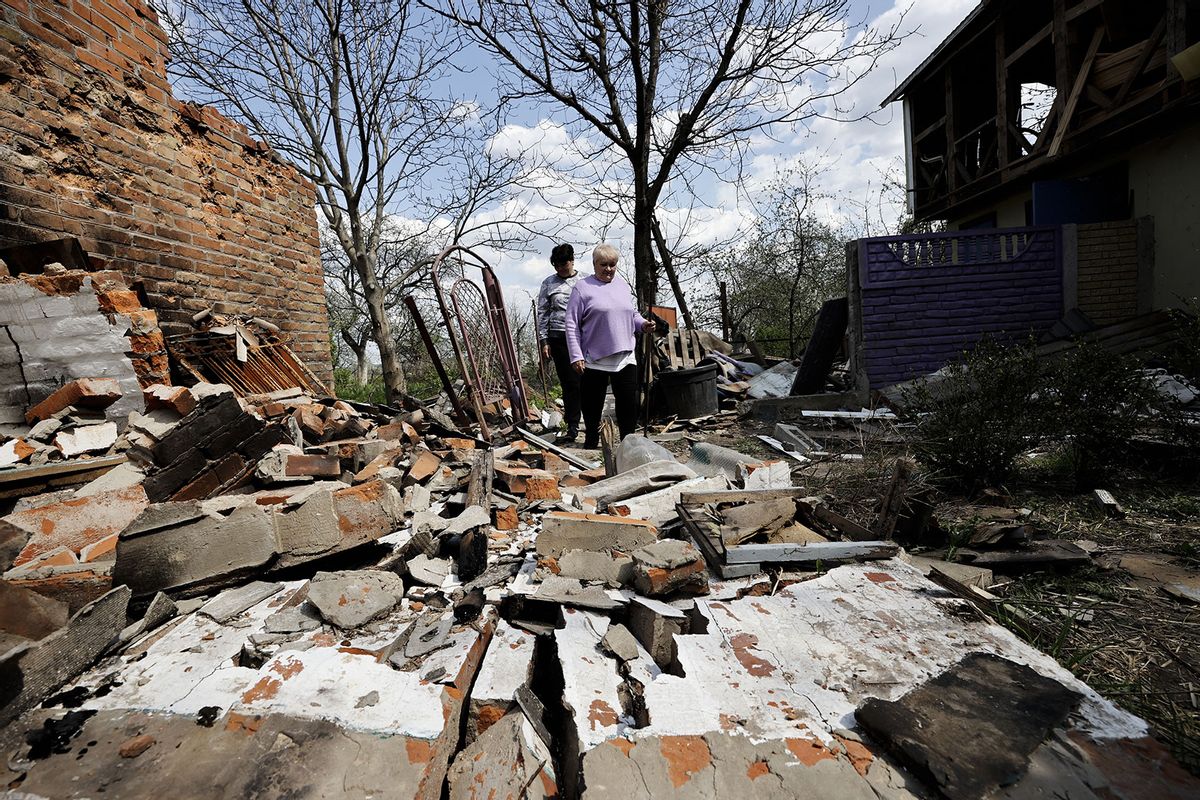Ukrainians clear debris and search for usable material after the Russian attacks in Andriivka, Poltava Oblast, Ukraine on May 2, 2022. (Dogukan Keskinkilic/Anadolu Agency via Getty Images)