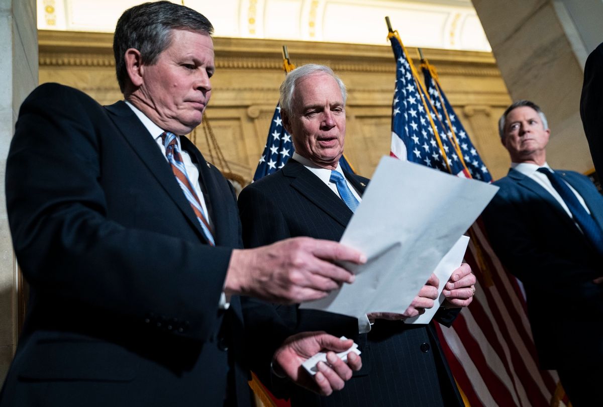 Sen. Steve Daines, R-Mont., and Sen. Ron Johnson, R-Wis., listen during a press conference about crime on Capitol Hill on Wednesday, Feb. 09, 2022 in Washington, DC.  (Jabin Botsford/The Washington Post via Getty Images)