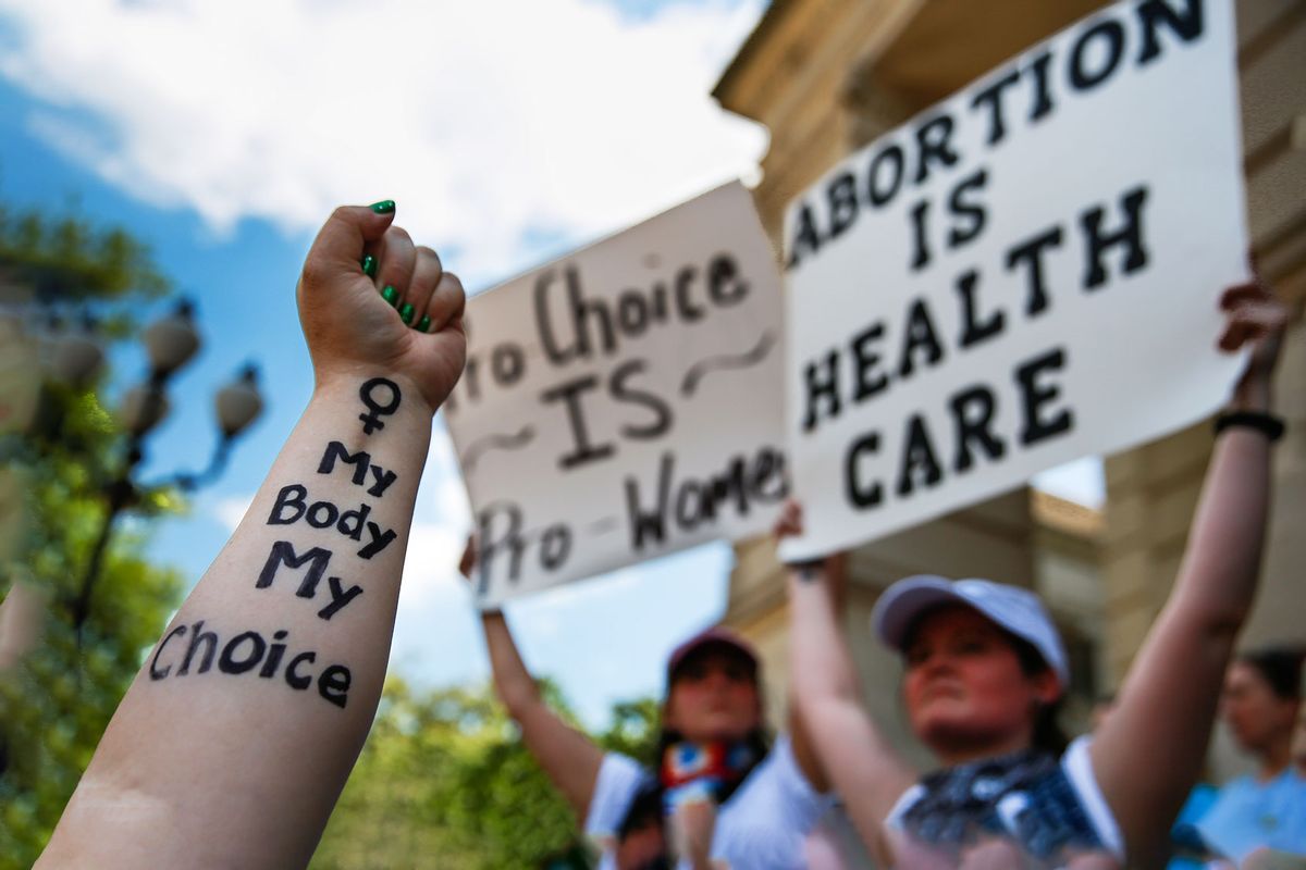 A woman holds up her arm with "My Body My Choice" written on it during a protest against the abortion ban bills at the Georgia State Capitol building, on May 21, 2019 in Atlanta, United States. (Elijah Nouvelage/Getty Images)