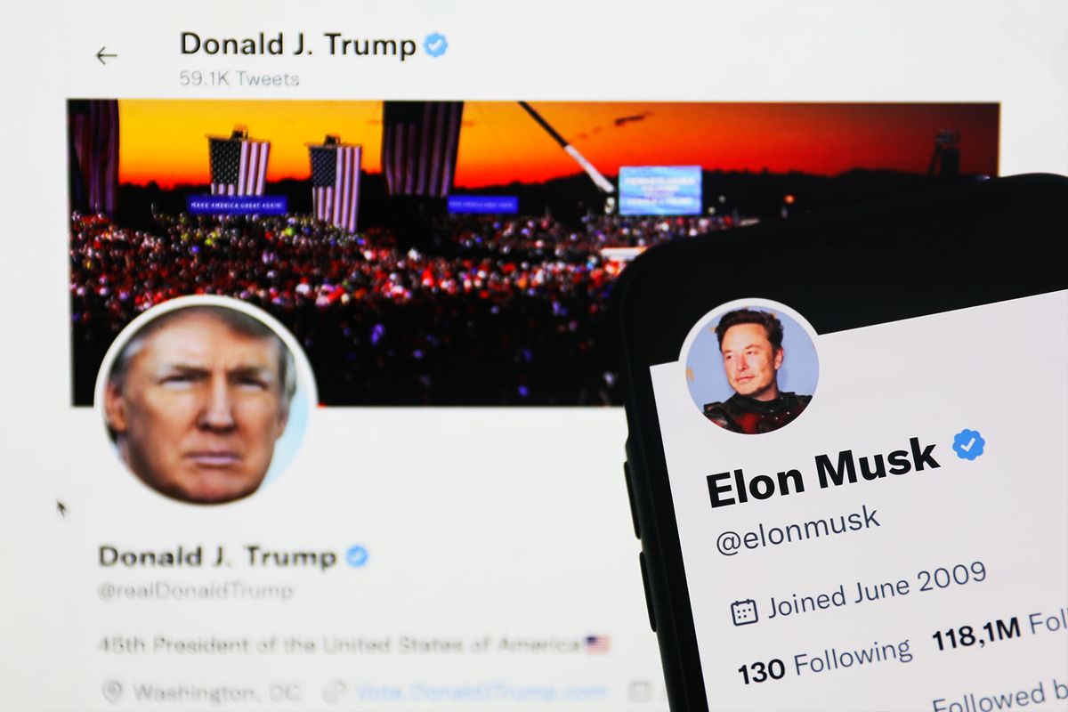 Donald Trump Twitter account displayed on a laptop screen and Elon Musk Twitter account displayed on a phone screen (Jakub Porzycki/NurPhoto via Getty Images)