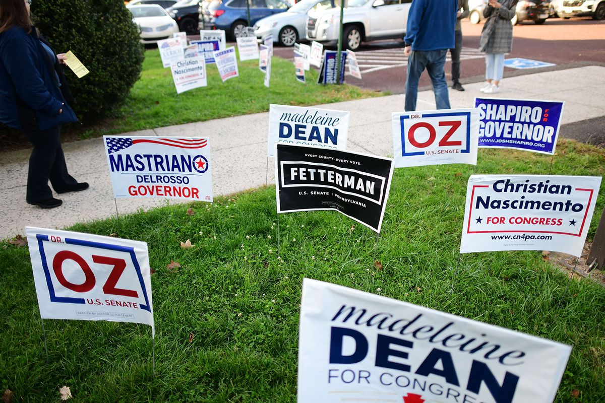 A variety of campaign yard signs are displayed outside the Rydal Elementary School West polling location before Democratic Gubernatorial candidate Josh Shapiro arrived to cast his ballot on November 8, 2022 in Rydal, Pennsylvania. (Mark Makela/Getty Images)