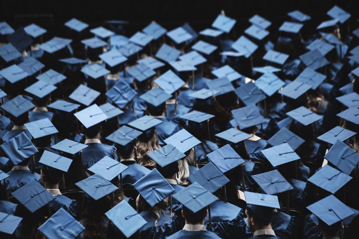 High Angle View Of Graduates (Getty Images / Alan Varajas / EyeEm)
