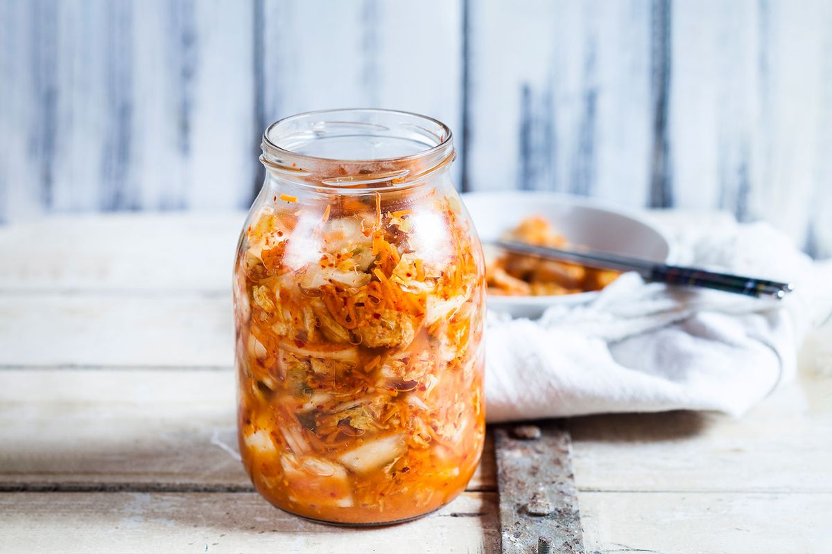Glass of homemade Korean Kimchi with chinese cabbage, scallions and carrots (Getty Images/Westend61)