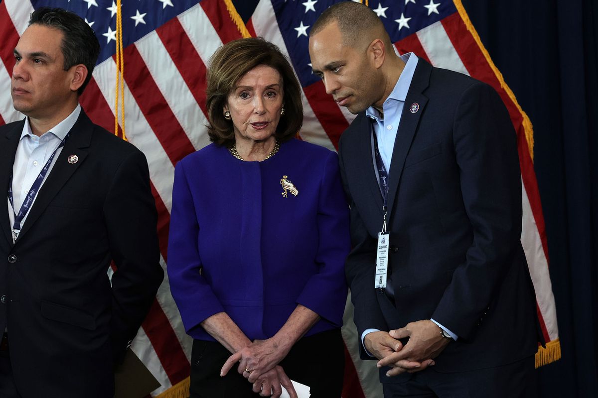U.S. Speaker of the House Rep. Nancy Pelosi (D-CA) (C), Rep. Pete Aguilar (D-CA) (L) and Democratic Caucus Chairman Hakeem Jeffries (D-NY) (R) listen during a news conference at the 2022 House Democratic Caucus Issues Conference March 11, 2022 in Philadelphia, Pennsylvania. (Alex Wong/Getty Images)