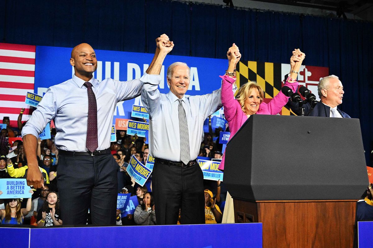 Gubernatorial candidate Wes Moore, US President Joe Biden, US First Lady Jill Biden and US Senator Chris Van Hollen acknowledge the crowd during a rally on the eve of the US midterm elections, at Bowie State University in Bowie, Maryland, on November 7, 2022. (MANDEL NGAN/AFP via Getty Images)
