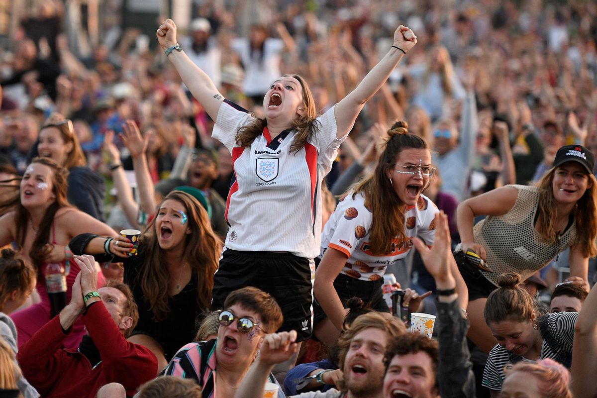 England fans react as they watch England's victory over Norway in the 2019 FIFA Women's World Cup quarter-finals on the West Holts stage during day two of Glastonbury Festival at Worthy Farm, Pilton on June 27, 2019 in Glastonbury, England. (Leon Neal/Getty Images)