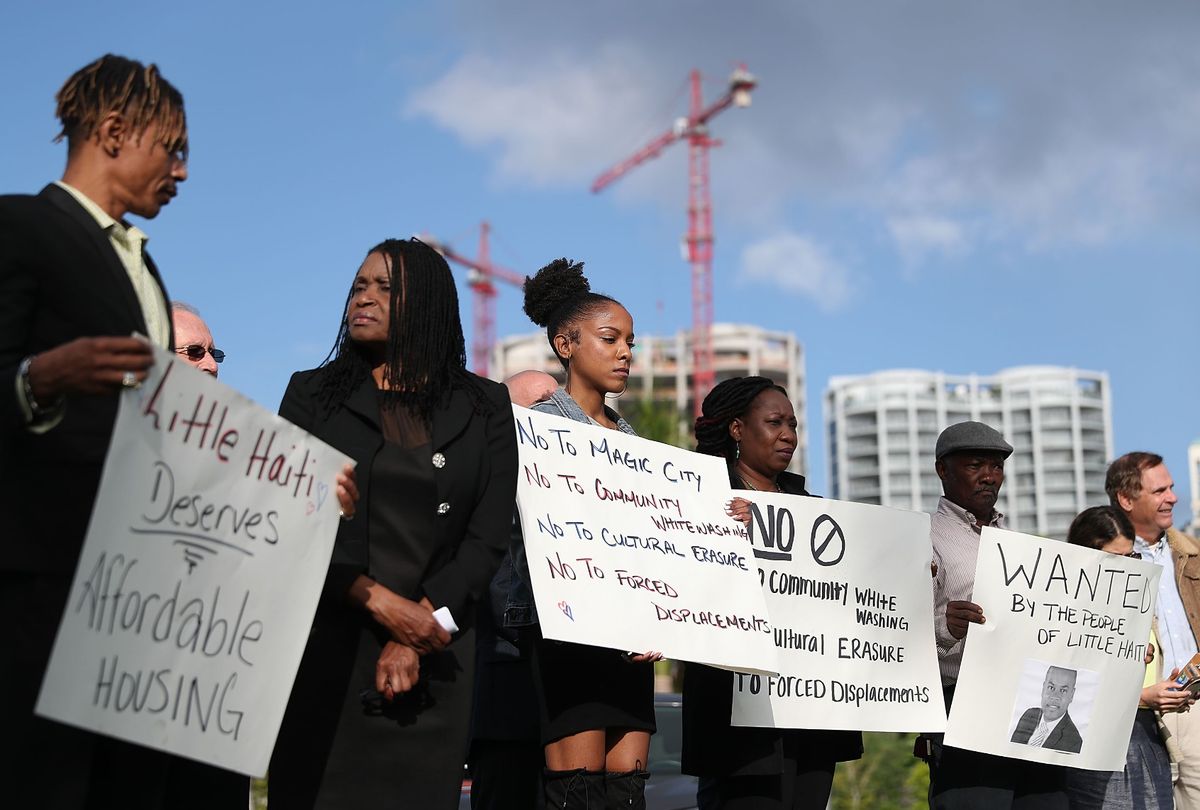 Residents and activists protest, in front of the Miami City Hall, against the proposed office, retail and residential project planned for Little Haiti on March 28, 2019 in Miami, Florida.  (Joe Raedle/Getty Images)