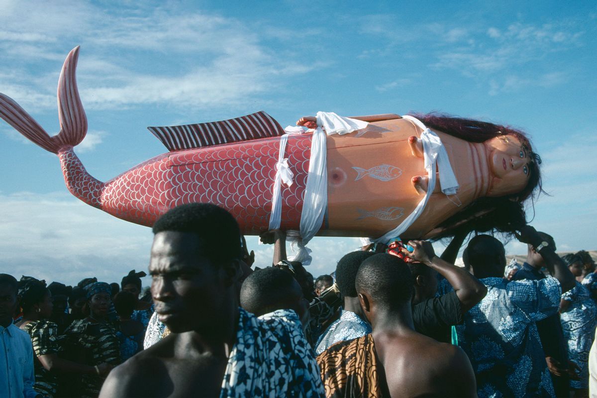 Ghana, Teshie, Coffin made and painted to resemble a mermaid for Ga tribal priestess of sea god carried by funeral guests. (Eye Ubiquitous/Universal Images Group via Getty Images)