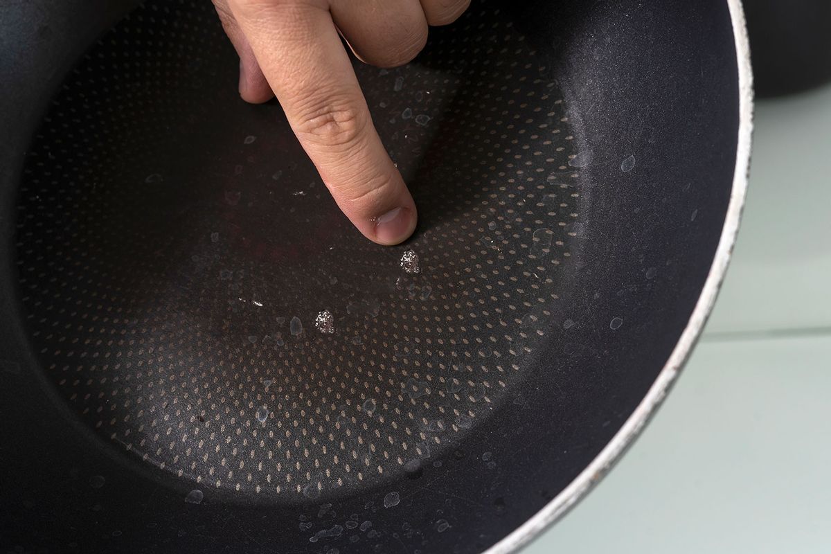 Damaged non-stick coating in the pan (Getty Images/Elena Gurova)