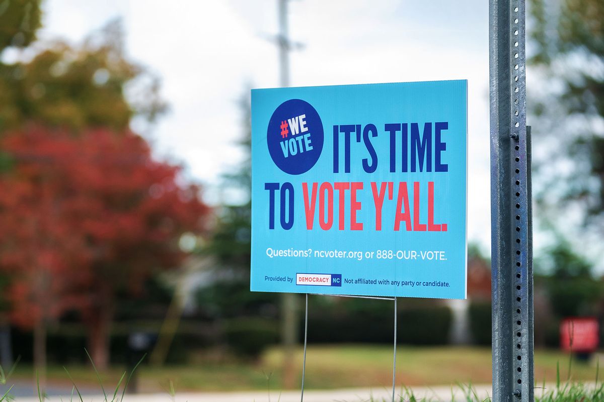 A sign made by the group Democracy NC reads It's time to vote y'all, on November 5, 2022 in Charlotte, North Carolina. Today marked the last day for early voting in the state before Election Day on November 8. (Sean Rayford/Getty Images)
