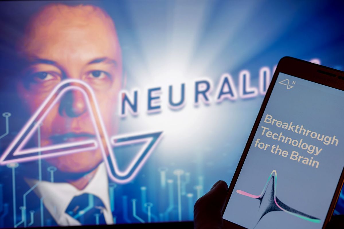 Neuralink logo is displayed on mobile with founder Elon Musk seen on screen in the background. (Photo Illustration by Jonathan Raa/NurPhoto via Getty Images)