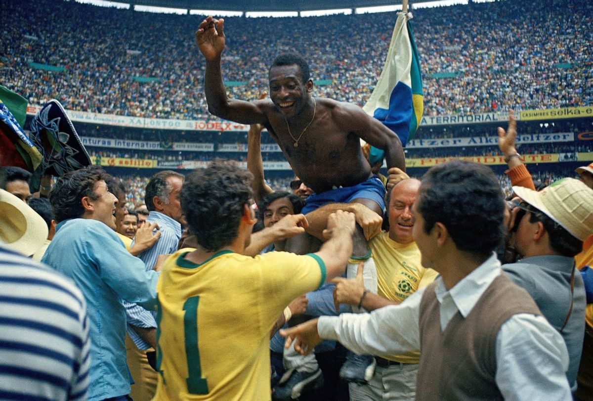 Pele of Brazil celebrates the victory after winning the 1970 World Cup in Mexico match between Brazil and Italy at Estadio Azteca on 21 June in Città del Messico (Alessandro Sabattini/Getty Images)