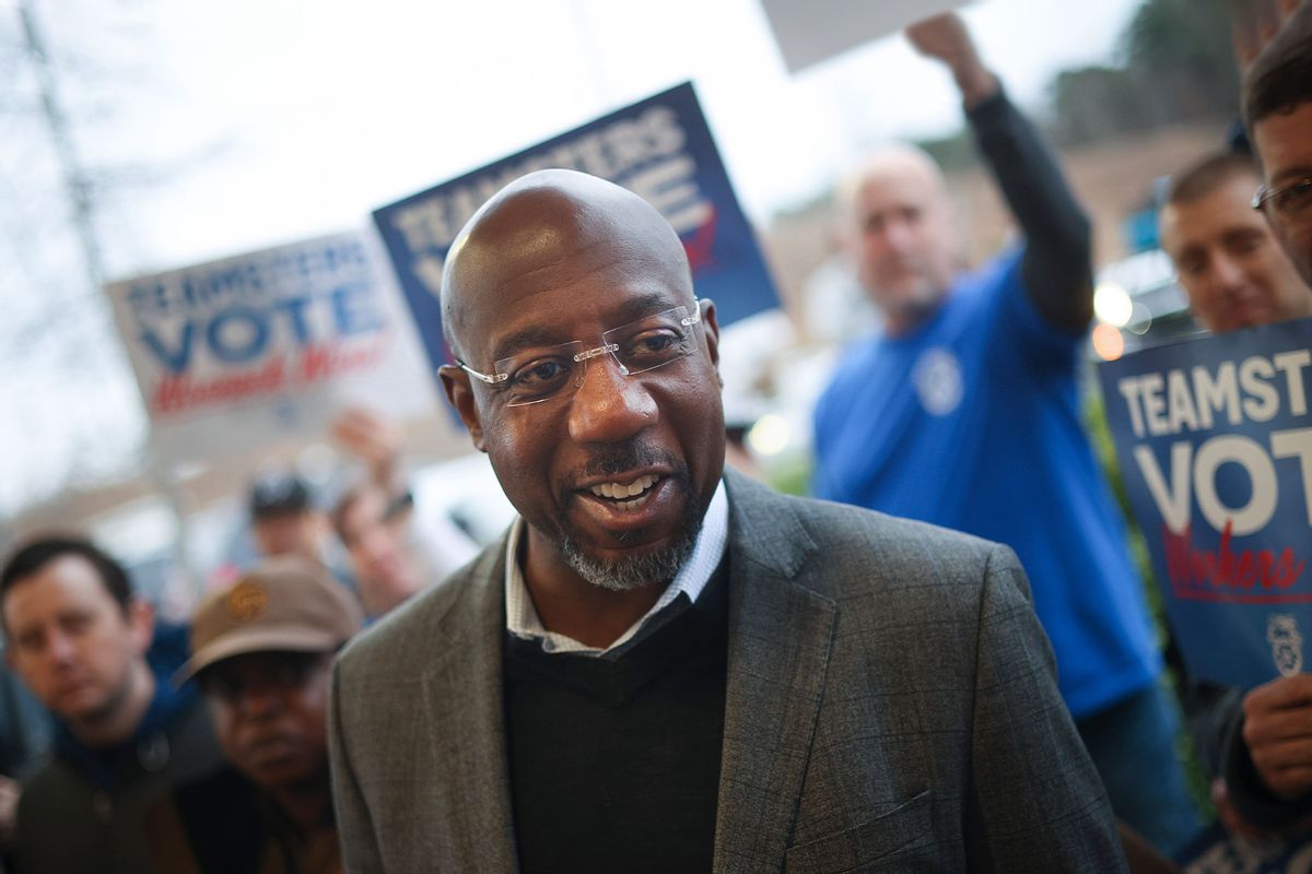 Georgia Democratic Senate candidate U.S. Sen. Raphael Warnock (D-GA) speaks at a Get Out the Vote event with members of the Teamsters at a UPS worksite December 5, 2022 in Atlanta, Georgia. (Win McNamee/Getty Images)