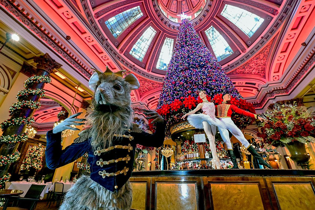 Scottish Ballet dancers Roseanna Leney as The Sugarplum Fairy, Jerome Barnes as The Nutcracker Prince and Javier Andreu as The Rat King posing in The Dome bar on November 25, 2021 in Edinburgh, Scotland. (Jeff J Mitchell/Getty Images)