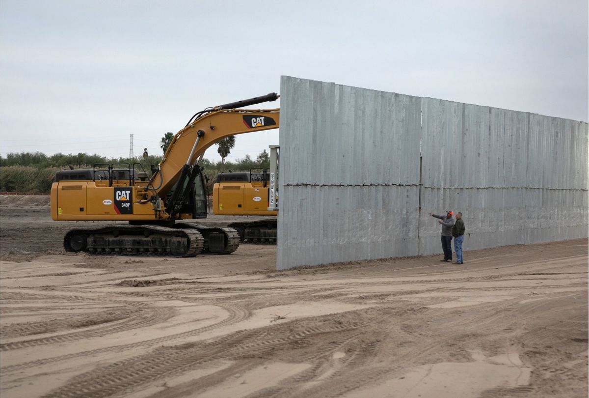 A construction crew works on a section of privately built border wall funded by hardline immigration group We Build The Wall on December 11, 2019 near Mission, Texas. (John Moore/Getty Images)