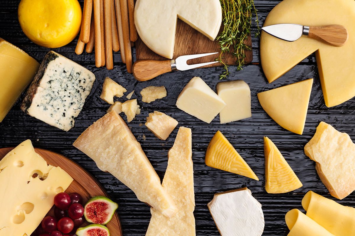 A table filled with a wide variety of cheeses (Getty Images/fcafotodigital)