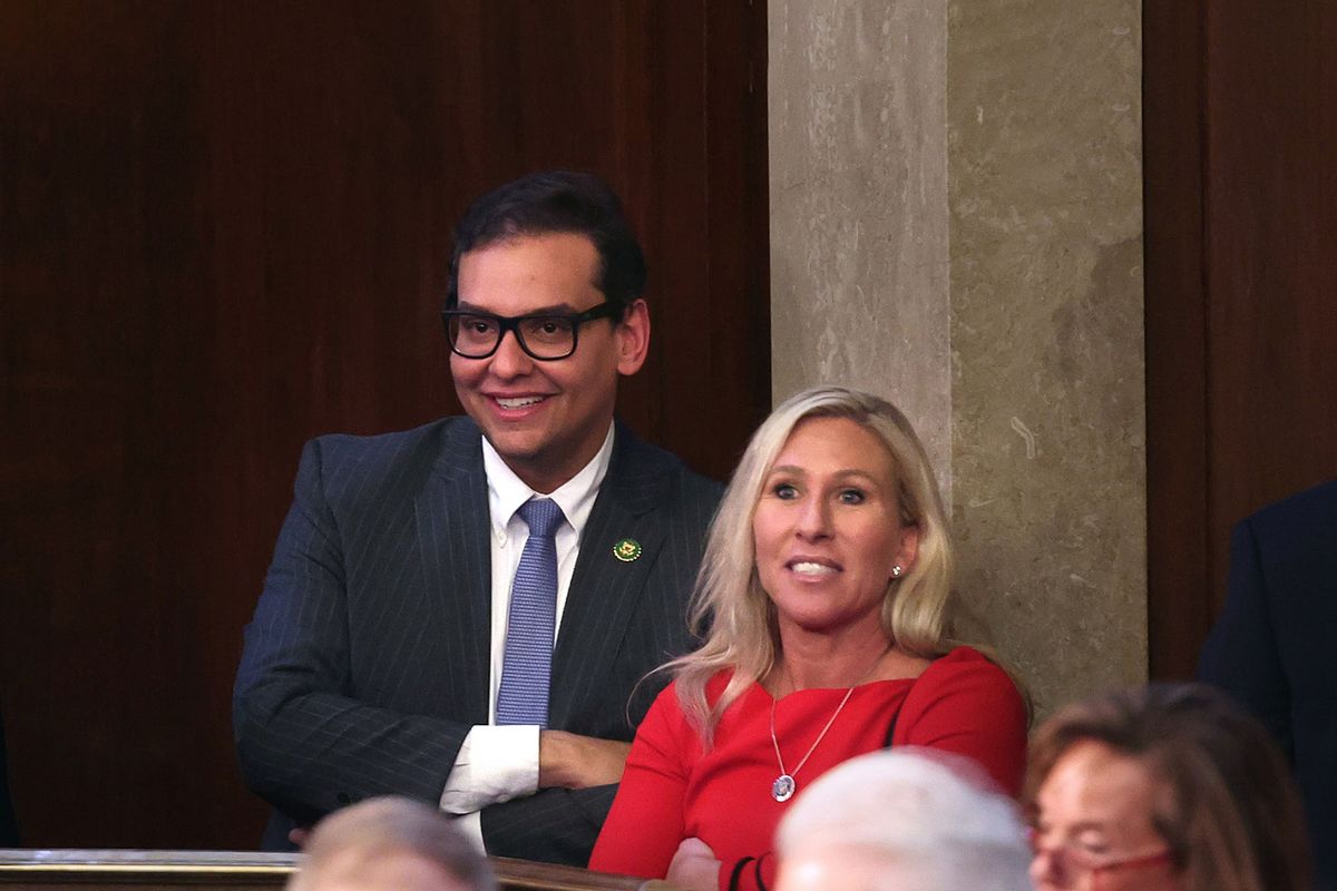 U.S. Rep.-elect George Santos (R-NY) (L) stands with to Rep.-elect Marjorie Taylor Greene (R-GA) in the House Chamber during the second day of elections for Speaker of the House at the U.S. Capitol Building on January 04, 2023 in Washington, DC. (Win McNamee/Getty Images)
