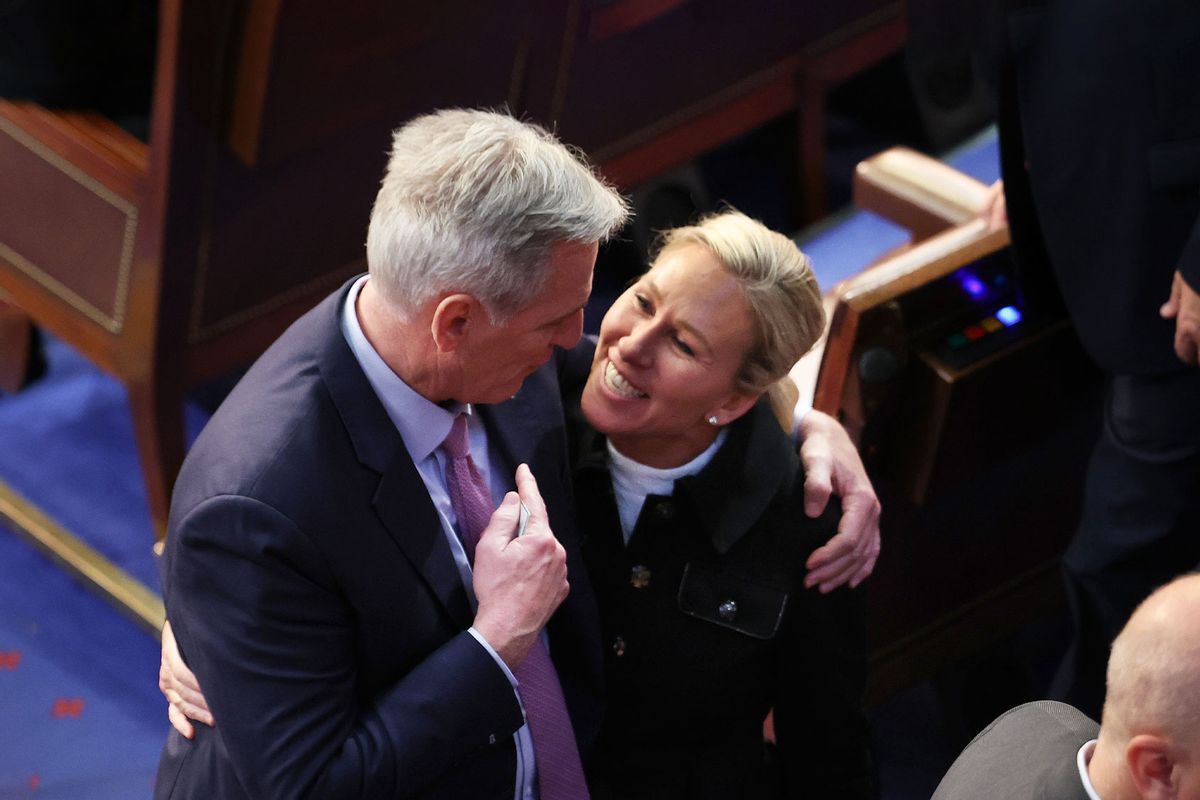 U.S. House Republican leader Kevin McCarthy (R-CA) (L) embraces Rep.-elect Majorie Taylor Greene (R-GA) in the House Chamber during the fourth day of elections for Speaker of the House at the U.S. Capitol Building on January 06, 2023 in Washington, DC. (Kevin Dietsch/Getty Images)