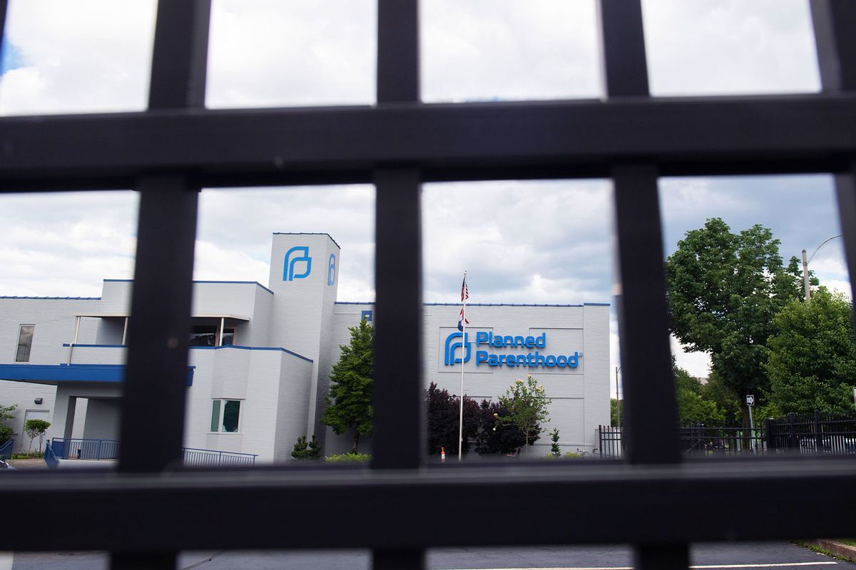 The outside of the Planned Parenthood Reproductive Health Services Center is seen through a gate (SAUL LOEB/AFP via Getty Images)