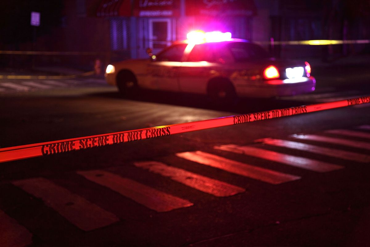 Police car and crime scene tape (Getty Images/DenisTangneyJr)