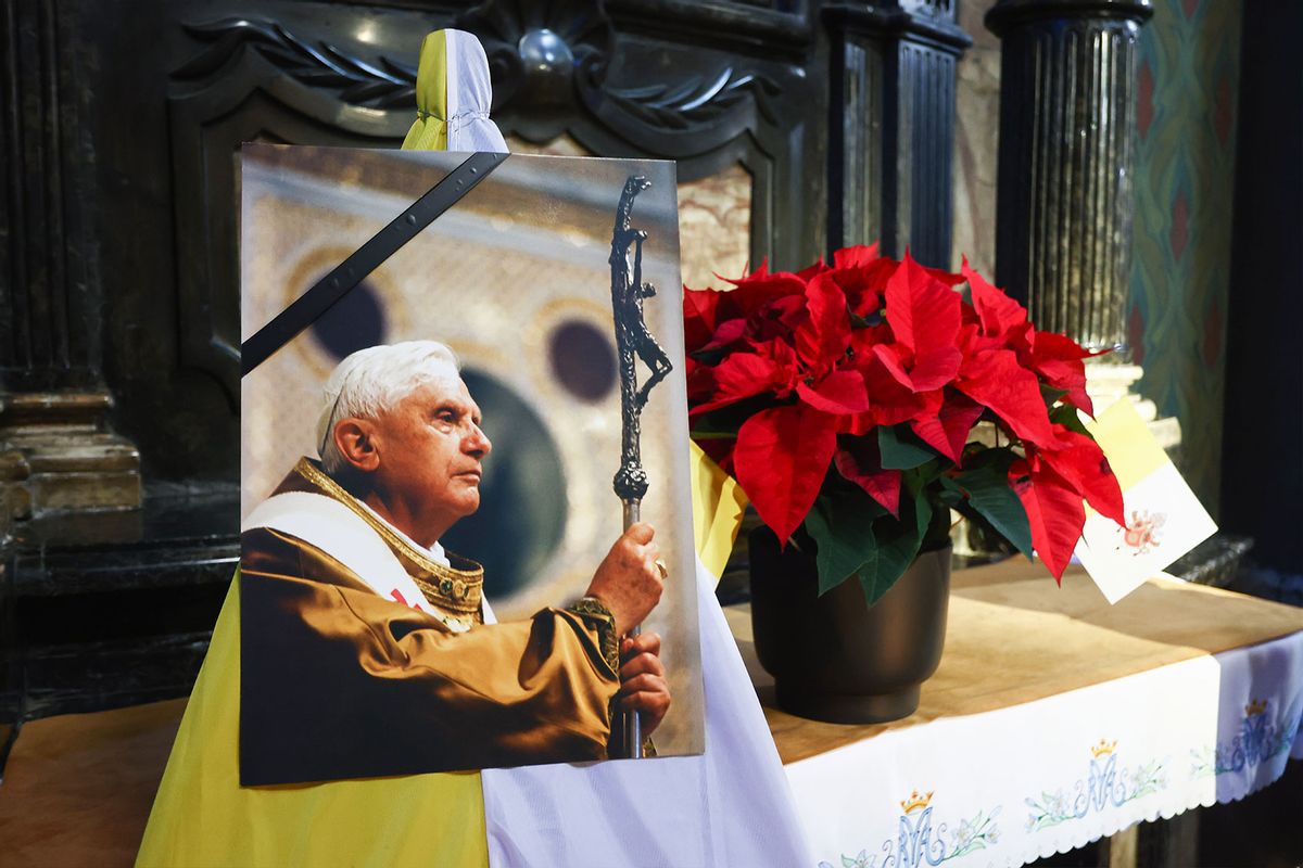 Church of St. Francis of Assisi commemorates the late Pope Emeritus Benedict XVI displaying his portrait picture with a black ribbon, on January 04, 2023 in Krakow, Poland. (Beata Zawrzel/NurPhoto via Getty Images)