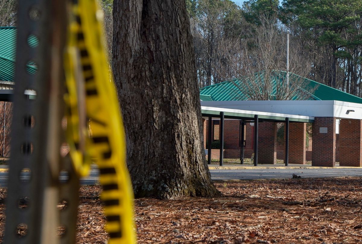 Police tape hangs from a sign post outside Richneck Elementary School following a shooting on January 7, 2023 in Newport News, Virginia.  (Jay Paul/Getty Images)