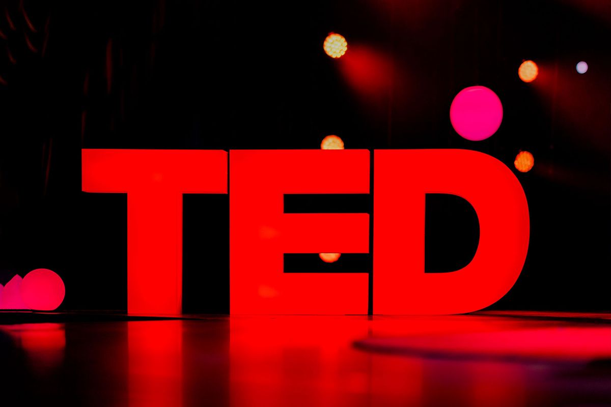 The TED logo stands illuminated on stage in the Community Theater in Vancouver, Canada. (Lawrence Sumulong/Getty Images)