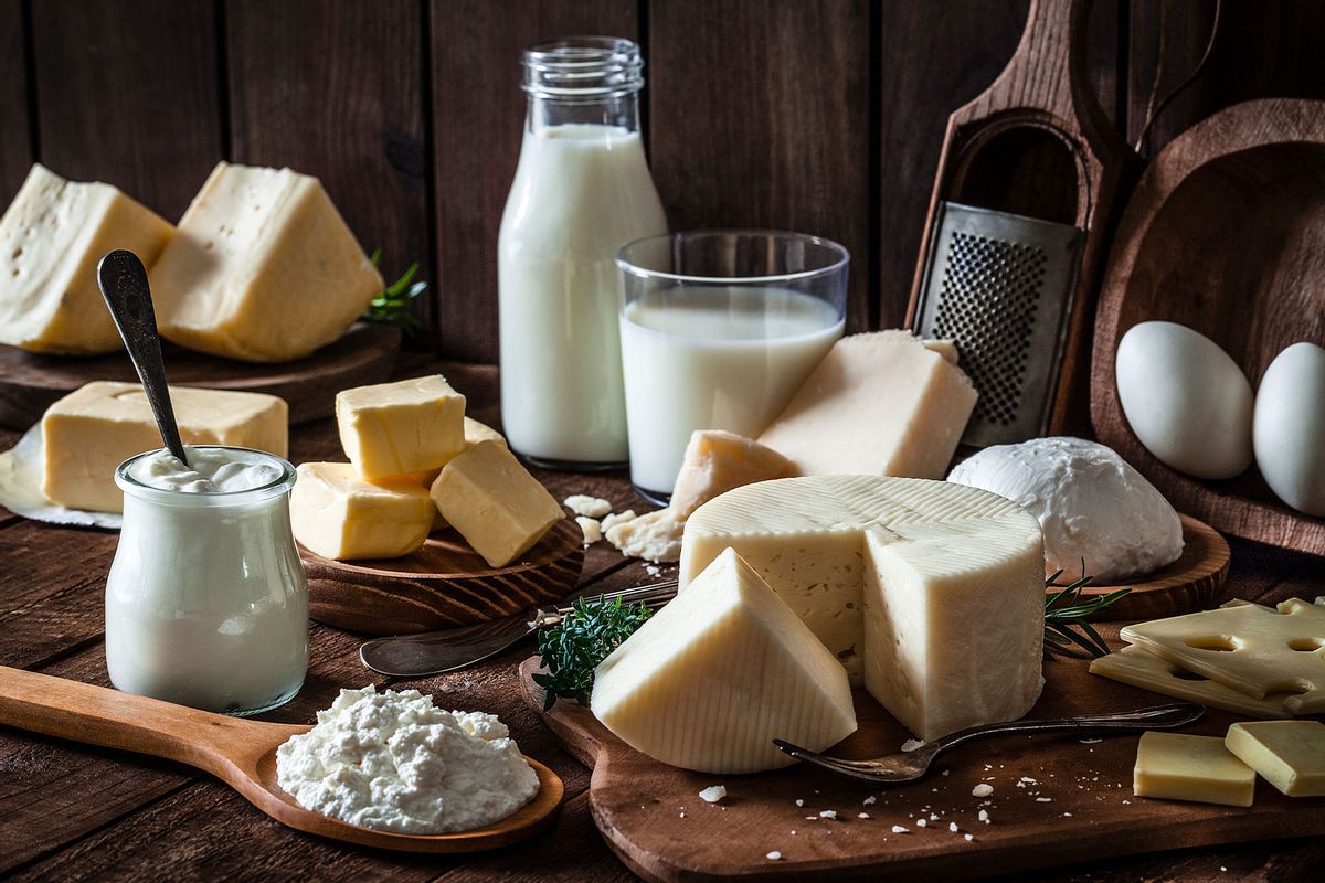 Dairy products assortment shot on rustic wooden table. (Getty Images/fcafotodigital)
